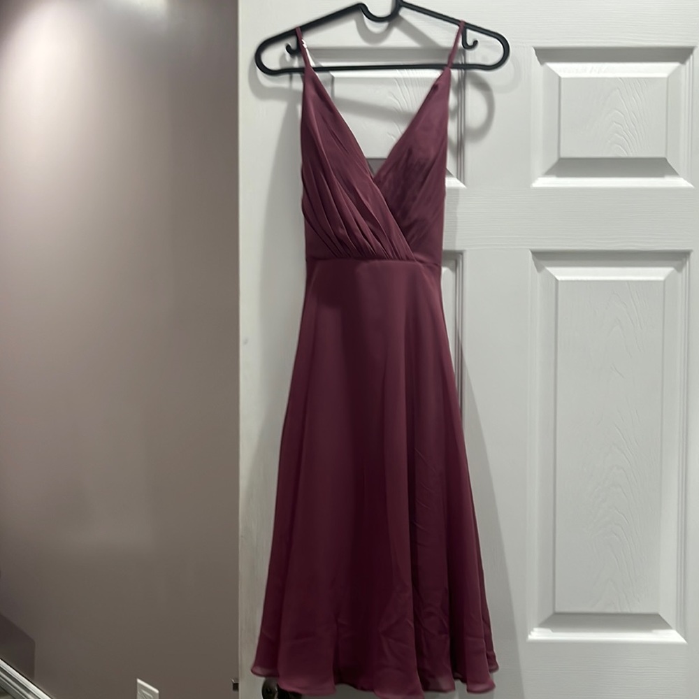 Simple dress was worn once at a party no damages like new.